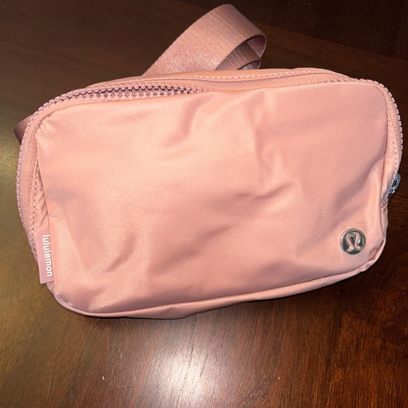 lululemon athletica Handbags - NWT lululemon RARE Everywhere Belt Bag- Pink